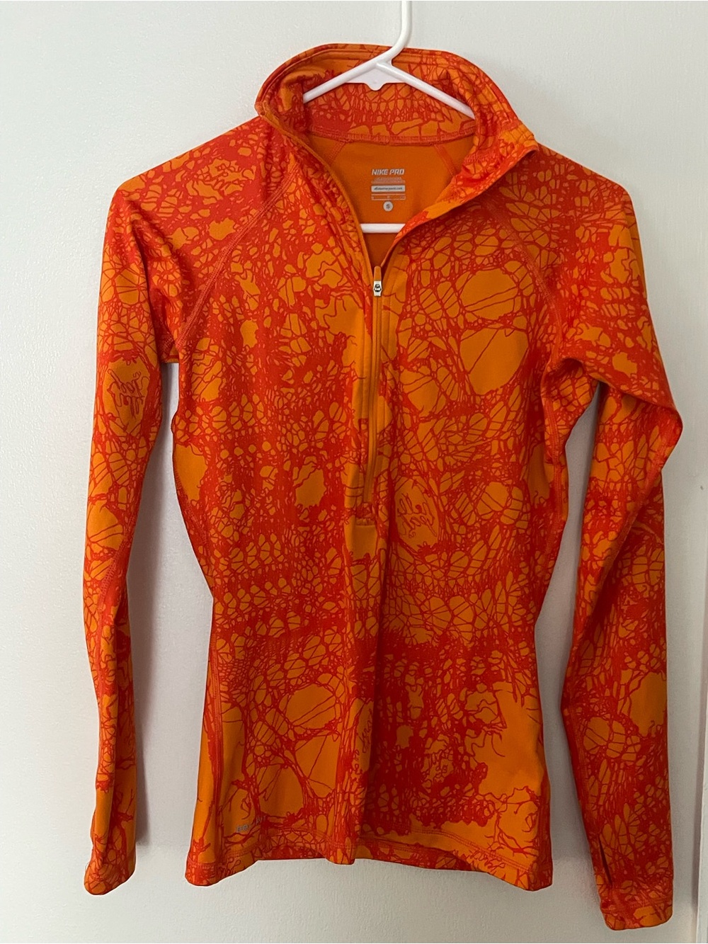 Nike Women’s Orange and Red Abstract Zip-Front Training Top